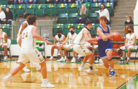 Dublin Lions Cooper Hubble, Dalan Rasberry and Chris Teten move to block Peaster offense at the net during Friday night’s game on the Dublin High School hardwood in the Roy &amp; Lynn Neff Gym. Paul Gaudette | Citizen staff photo