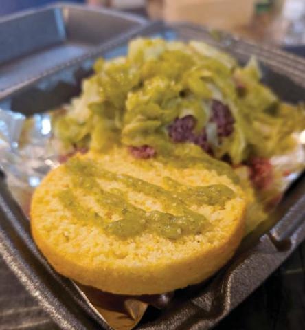 'The Thing' is one of the offerings at Shenanigans Irish Pub which is set to open Sept. 4 in downtown Dublin. The dish includes a Texas spin on corned beef and cabbage featuring a cornbread bun and tomatillo sauce. Wyndi Veigel-Gaudette | Citizen staff photo