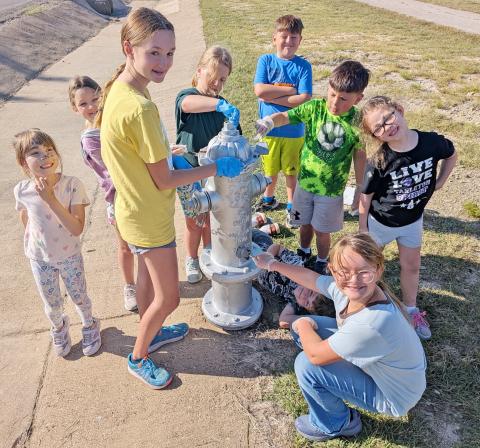 Cub Scouts, 4-H paint hydrants