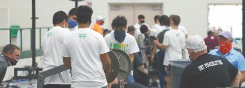 Boys lift silver at home