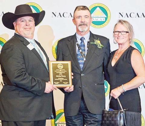 Comanche County Extension Agent Michael Berry was recently presented with the Distinguished Service Award from the National Association of County Agricultural Agents during the annual meeting in Dallas. Paul Gaudette | Citizen staff photo