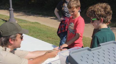 A park ranger with Texas Parks & Wildlife educates young boys on nonvenomous snakes in Texas. Kids and adults alike were able to give gentle pets to the snakes. For more photos see The Dublin Citizen Facebook page. Wyndi Veigel-Gaudette | Citizen staff photo