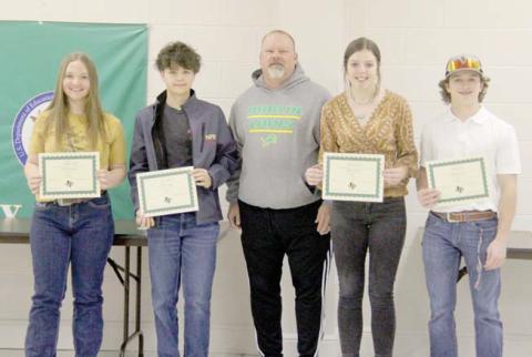 Athletic Scholars Junior high athletes Joe Salinas and Addison Ivie and high school athletes Aiden Salyer and Cassidy Adair. Presented by Athletic Director Greg Hardcastle.