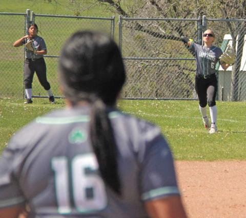 Dublin Lady Lions move the ball from outfield to infield during the March 11 home game against Peaster. Paul Gaudette | Citizen staff photo