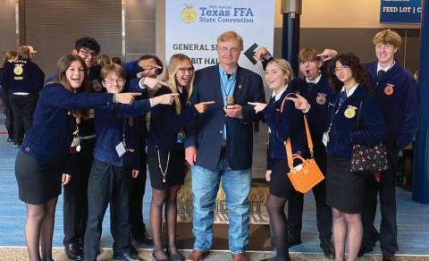 Dublin FFA sponsor Darren Price, center, recently received the Area 4 Golden Owl (or Teacher of the Year) at the State FFA Convention. Price has been in agricultural education for more than 35 years. Submitted photo