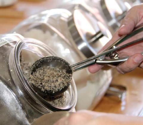 Customers can choose from a variety of scrubs including coffee scrubs at Back Home General Store to place inside their own containers. Paul Gaudette | Citizen staff photo