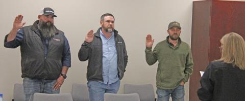 New Lingleville School Board members Jerod James, Andrew Grimm and Justin Wilson were sworn in at the regular Nov. 21 meeting. Paul Gaudette | Citizen staff photo