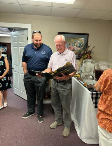 A reception was held Friday, July 28 honoring the retirement of former Erath County Chief Appraiser Jerry Lee. Pictured with him is current Erath County Chief Jonathan Pringle, presenting Lee with a special retirement gift. Courtesy photo