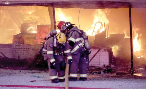 Multiple departments battle a structure fire Thursday, Aug. 21 at Cutting Edge Cabinets on Hwy. 377 between Dublin and Stephenville. Dublin, Lingleville, Proctor, Stephenville, Harbin, Erath County Fire/ Rescue, Erath County Fire Marshal, Erath County Sheriff’s Office and DPS. Wyndi Veigel-Gaudette | Citizen staff photo