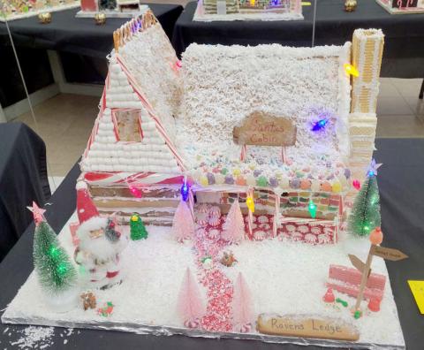 Wyndi Veigel-Gaudette | Citizen staff photo Santa’s Cabin, made by Raven’s Ledge in downtown Dublin, was named as the People’s Choice Winner in the inaugural gingerbread house decorating competition hosted by Revitalize Dublin as a fundraiser. Twenty entries participated in the event and houses were showcased at Grafton Center.