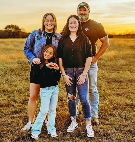Derris Lueck, a 2010 graduate, enjoys her life working in her real estate business and sharing time with her husband Tyson, and daughters. Submitted photo