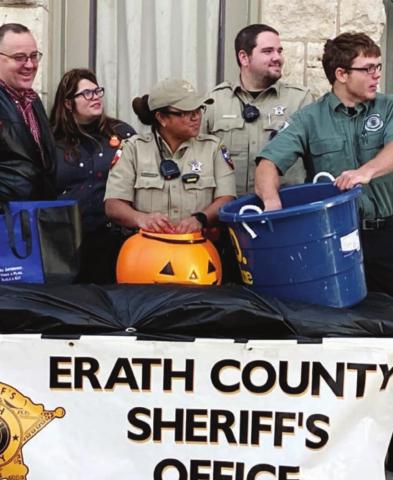 Erath County Sheriff’s deputies and members of the Explorers program handed out candy during Stephenville’s safe trick-or-treat event last week. Members of the post are Stephen Alcorn and Malichi Hambrick. | submitted photos