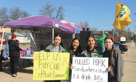 Paul Gaudette | Citizen staff photo The Brookshire Brothers parking lot was filled with delicious smoky smells Saturday, March 9 as Lady Lions and supporters served up a pulled pork sandwich fundraiser. Proceeds from the event went to help buy player banners for the home stadium