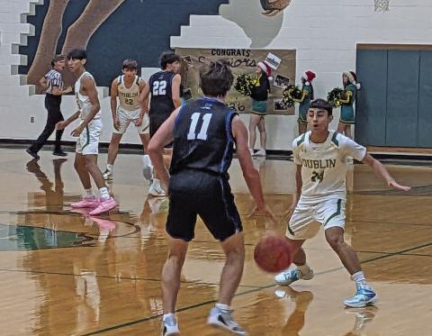 Dublin Lions scatter to cover Peaster Greyhounds advancing up court in the Friday, Dec. 19 home game. Paul Gaudette | Citizen staff photo