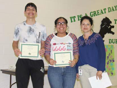 Academic Scholars Aiden Hernandez and Karina Ortega. Presented by DHS Principal Norma Briseno.