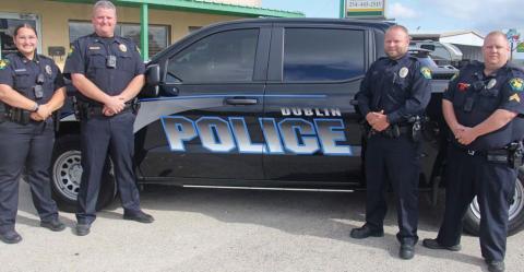 Dublin Police Chief Cameron Ray congratulates the most recent round of promotions in the department. From left is Sgt. Kristi Bonilla, Chief Ray, Lt. Khris Jennings and Sgt. Jacob Ivie. Paul Gaudette | Citizen staff photo