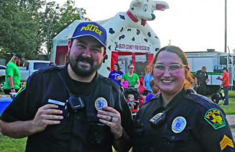 Police Officer Cody Cook and Sgt. Kristi Bonilla welcome neighbors to the 2nd annual National Night Out Tuesday, Oct. 7 at Perry Hall. The event was organized by the Dublin Police Department and the Stephenville Area Elks Lodge and gave citizens the chance to meet first responders. Paul Gaudette | Citizen staff photo