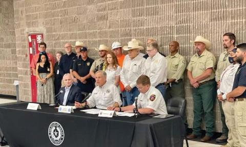 Abbott visits area for fire declaration