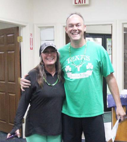 Visitors participate in the Dublin Chamber of Commerce’s St. Patrick’s Day Scavenger Hunt by locating clues around town including one hidden at the Dublin Public Library.