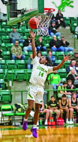 Dublin Lion Julian Caldera springs up for a 2 against Comanche in the Jan. 30 home game. Danielle Meador | Citizen staff photo