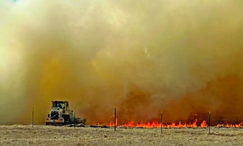 A dozer cuts a line through pastureland during a wildfire over the weekend. An uptick in grass fires was seen last weekend throughout the county, and Erath County along with several other surrounding counties are now under a burn ban. Kari Lanting | Courtesy photo