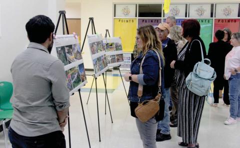 Citizens review a wide variety of design boards at a community-wide dinner Monday, Sept. 23 at the Dublin Intermediate School in the feedback portion of the design workshop for Citizens’ Institute on Rural Design (CIRD). For more renderings of the park project see The Dublin Citizens’ Facebook page. Paul Gaudette | Citizen staff photo