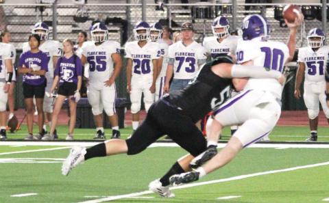 Dublin Lion Cooper Pickett sacks a Florence Buffalo behind the line of scrimmage (above) while Dalan Rasberry and Kaden Gaitan crowd a Florence receiver to stop a pass in Friday night’s game on the Bob &amp; Norma Cervetto Field. Paul Gaudette | Citizen staff photos