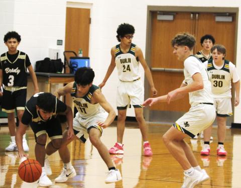 The JV Lions who are seen facing off against the Brady Bulldogs, claimed a third place finish in the Dec. 4-6 Dublin Athletic Booster Club Tournament after going 1-2 against their opponents. Paul Gaudette | Citizen staff photo