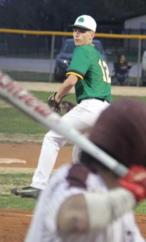 Dublin Lion Zak Loper winds up to pitch to a DeLeon batter during the Feb. 28 home game. Paul Gaudette | Citizen staff photo