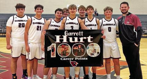 Lingleville Cardinal Garrett Hurt was recognized Tuesday, Feb. 3 for passing 1,000 points. | Submitted photo