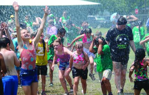 Dublin Elementary School students cool off after a long, fun day at Field Day Thursday, May 14 thanks to water sprayed by members of the Dublin Volunteer Fire Department. For more field day photos go to The Dublin Citizen Facebook page. Wyndi Veigel-Gaudette | Citizen staff photo