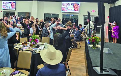 Crowds enjoy playing ‘Heads’ or ‘Tails’ in order to raise funds for Cross Timbers Fine Arts Council at its annual fundraising dinner Friday, Feb. 6 at The Legacy. For more photos see The Dublin Citizen Facebook page. Wyndi Veigel-Gaudette | Citizen staff photo