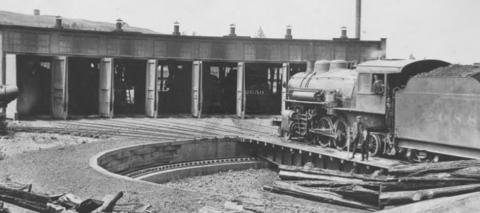 This picture is of the railroad shops in Malden, Washington in 1910. The shops we had here in Dublin must have looked much like this. Our roundhouse must have been made of wood, since carpenters arrived here and tore it down in a matter of days. Though the roundhouse was removed, the turntable stayed until 1954. Whitman County Library | Public Domain photo