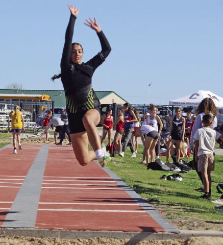 Dublin varsity Lady Lion Olivia Salyer placed first in the long jump at the Dublin Invitational Track Meet with a leap of 16’08.25”. Paul Gaudette | Citizen staff photo