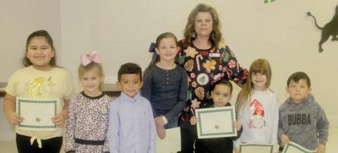 Lion Leaders for November Evelyn Uribe (not present) and Ezekiel Stodola (Pre-K), Angel Osornio and Dylan Stone (Kindergarten), Calvin De La Garza and Embree Hendrix (First grade), Elijah Peace ( not present) and Azalea Holguin (Second grade) and Ryan Johnson (not present) and Payton Williams (Third Grade). Presented by Principal Brandy Carr.