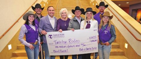 On hand for the Jan. 28 $1 million check presentation were (from left): Emily McDeavitt, Jacob Perkey, President James Hurley, Darla and Bob Doty, Kindall Hurley, Assistant Rodeo Coach Dylon Henson and Keni Labrum. | submitted photo