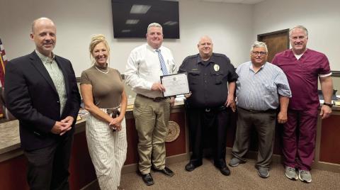 SRO Sergeant Jacob Ivie receives the Lifesaving award for saving a student at the Dublin Secondary School from choking. The award was presented by Director of Public Safety/ Police Chief Cameron Ray and City Councilmembers Bo Kabala, Nancy Williams, Mayor David Leatherwood and Councilmember Sammy Moore. Wyndi Veigel- Gaudette | Citizen staff photo
