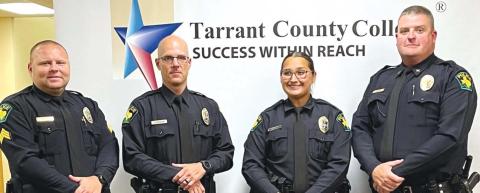 Dublin PD Sergeant Khristopher Jennings (left) and Chief Cameron Ray (right) pose with Jacob Carpenter and Kristi Bonilla who were sworn in to Dublin PD on May 25 after graduating from the law enforcement academy. Bonilla and Carpenter are the first officers brought into the department through the cadet program approved by the Dublin City Council last year. | submitted photo