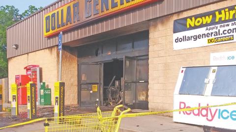 Carts and police tape barred entry to the Dublin Dollar General on June 9 after a fire, battled all night on June 8 by Dublin Volunteer Fire Department and local crews, resulted in a total loss of the building and inventory. Paul Gaudette | Citizen staff photo