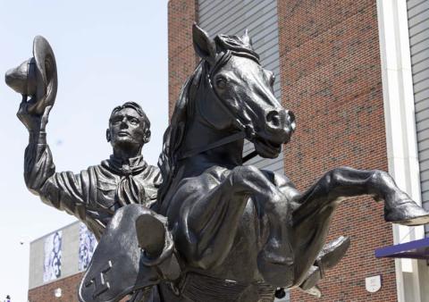 A statue embodiment of the Texan Rider was unveiled Aug. 24 at Tarleton’s Memorial Stadium in conjunction with the football season opener. Funding for the Texan Rider was provided by David Mayfield’s -M- Family Ranch to honor his life of ranching, his love of the land and his interest in Tarleton State rodeo sports. | Tarleton State University photo