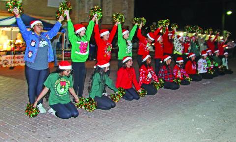 The Dublin Junior High Dance Team performs on Elm Street during the annual Cowboy Christmas festivities. Paul Gaudette | Citizen staff photo