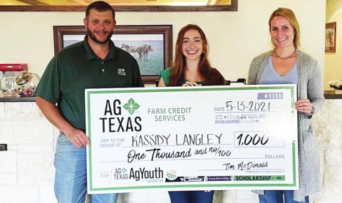 Hico FFA student Kassidy Langley was presented with a scholarship by AgTexas