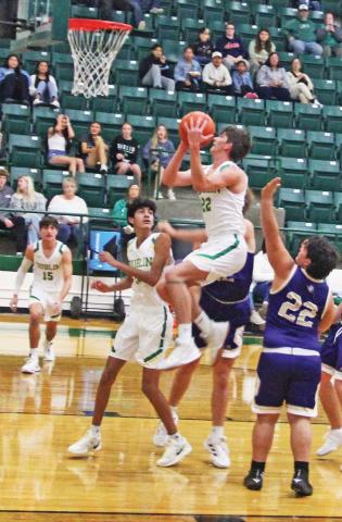 Dublin Lion Hunter Jones springs up around San Saba defenders to score 2 points in the Nov. 25 home game which resulted in a win for the Lions. Paul Gaudette | Citizen staff photo