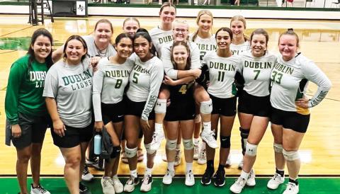 | Citizen staff and submitted photo Members of the Dublin Lady Lions volleyball team pose above after a scrimmage against Hico Saturday, Aug. 5 in the Roy and Lynn Neff Gym at Dublin Secondary School. At right, the players wait for the scrimmage to start as they cheer on the JV Lady Lions. The volleyball girls were set to return to the gym Tuesday, Aug. 8 as they took on the Hamilton Lady Bulldogs. Photos of that game will be available in next week’s edition.