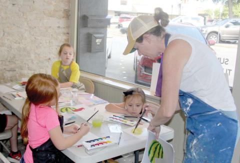 Girls concentrate on learning the techniques needed to master a watercolor watermelon painting at the annual Cross Timbers Fine Arts Camp held July 22-29. The camp offered a variety of art techniques and projects throughout the week for 58 kids, six instructors and 10 student volunteers. For more photos see the Dublin Citizen Facebook page. Wyndi Veigel-Gaudette | Citizen staff photo