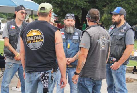 Servant Souls hosted a poker run bike event Saturday morning in conjunction with Day of the Cowboy, drawing 15 riders. The winner, Mercedes Scott, drew five aces to claim bragging rights. Paul Gaudette | Citizen staff photo