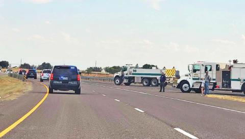 Emergency services escort the body of fallen Eastland County Deputy David Bosecker who was killed responding to a domestic disturbance Friday, July 21. Dublin firefighters and their families pay tribute to the deputy as the processional travels down the Dublin loop Saturday, July 22. Cameron Ray | Courtesy photo