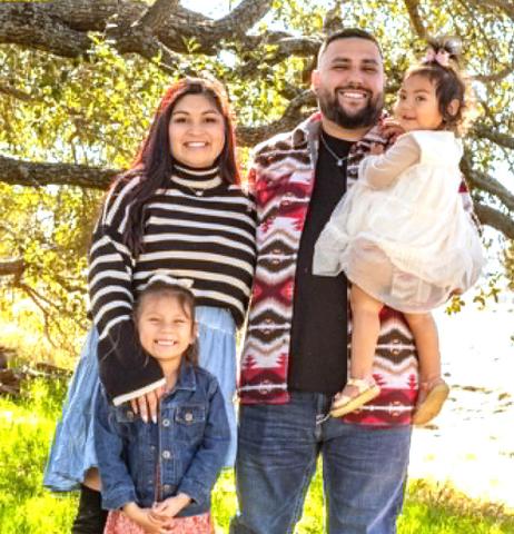 Duties during hostess job at Pulido’s restaurant sparked an interest in business for Judy Azua (pictured with her family) who now serves as office manager for Cashon Air Conditioning. Submitted photo