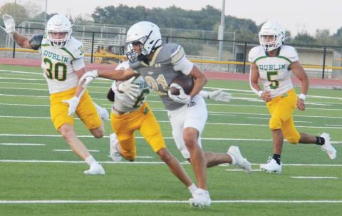 Dublin Lions DJ Ferguson, Christian Mendez and Ron Bahena rush in to tackle a Clyde ballrunner during the Aug. 22 scrimmage on the Cervetto Field. Paul Gaudette | Citizen staff photo