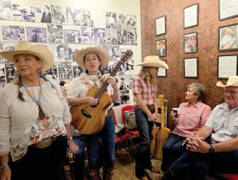 Live music entertains crowds inside the Dublin Rodeo Heritage Museum Saturday, July 26 for National Day of the Cowboy. Wyndi Veigel-Gaudette | Citizen staff photo